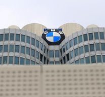 BMW will step up cost cuts after profit warning