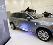 Toyota, SoftBank in talks to invest $1B in Uber AV unit, report says