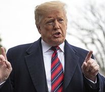 Trump heads to Ohio to laud military plant amid GM closure